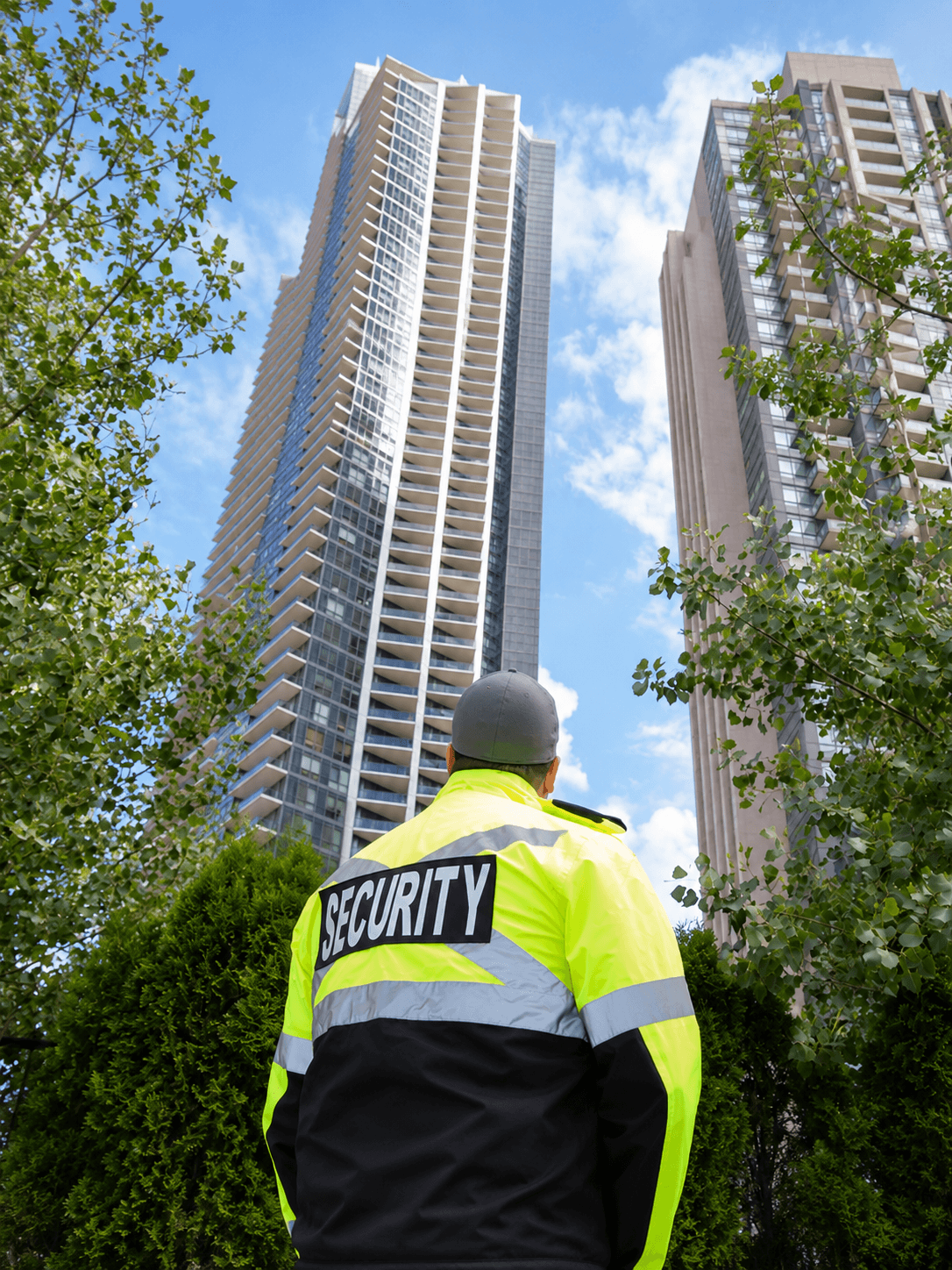 True Waves Uniformed Security Guard Officer looking at facility